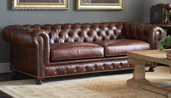 Elegant brown leather sofa in a residential living room, showcasing expert residential leather furniture repair in Waxhaw, NC