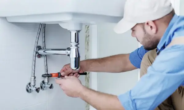 The plumber is repairing pipe in Charlotte, NC.